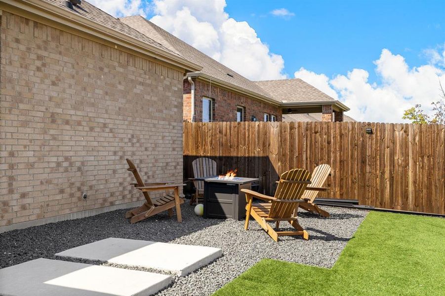 View of patio / terrace featuring an outdoor fire pit View of patio / terrace featuring an outdoor fire pit