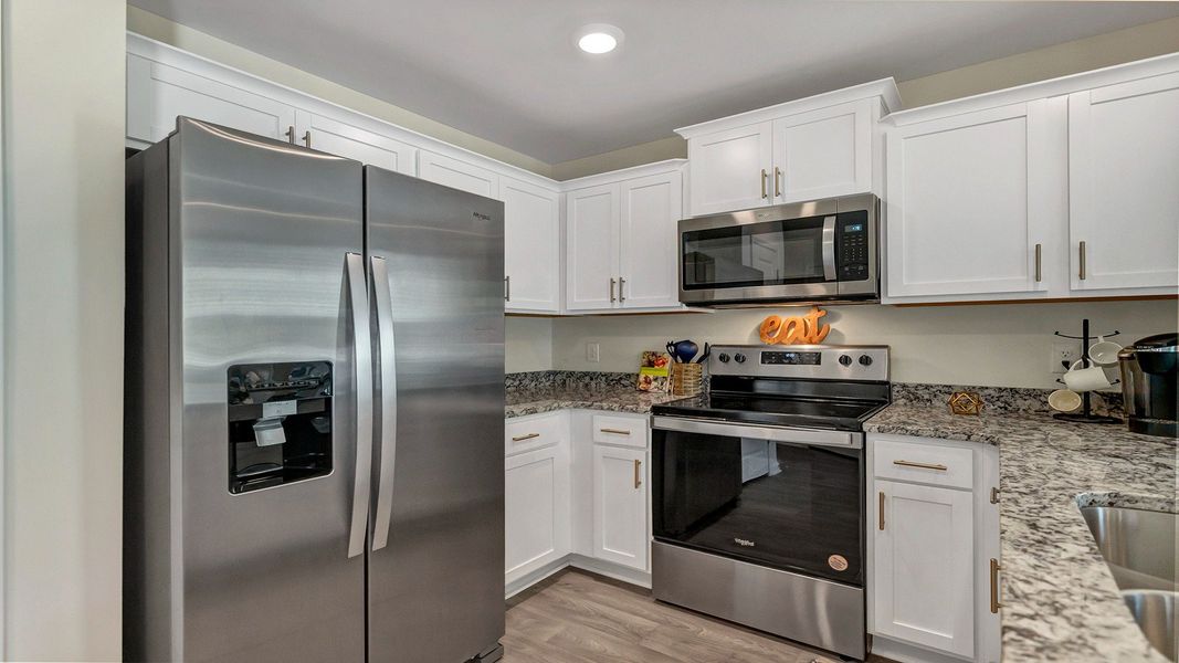 Representative furnished interior of a home built from the Pearson Th by D.R. Horton in Hunter's Branch Townhomes, Hopkins (Image 8).