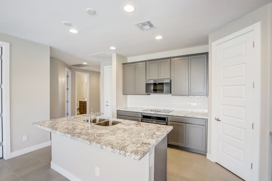 Representative furnished interior of a home built from the Castillo Series - Acacia by Brightland Homes in Castillo at Anderson Parc, Buckeye (Image 5). Representative furnished interior of a home built from the Castillo Series - Acacia by Brightland Homes in Castillo at Anderson Parc, Buckeye (Image 5).