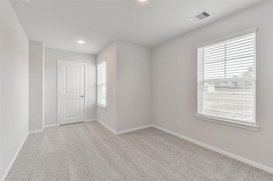 Spacious, unfurnished interior of a new home in Lakes at Black Oak, Magnolia (Image 64).