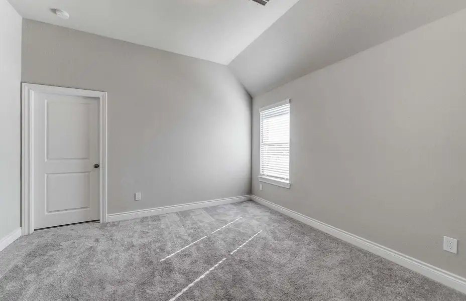 Representative unfurnished interior of a home built from the 3798 by Ravenna Homes in The Woodlands Hills 65′, Willis (Image 44).