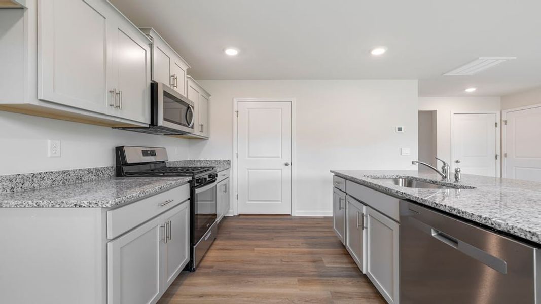 Furnished interior view inside a new home in Treemont Commons, Wellford (Image 10).