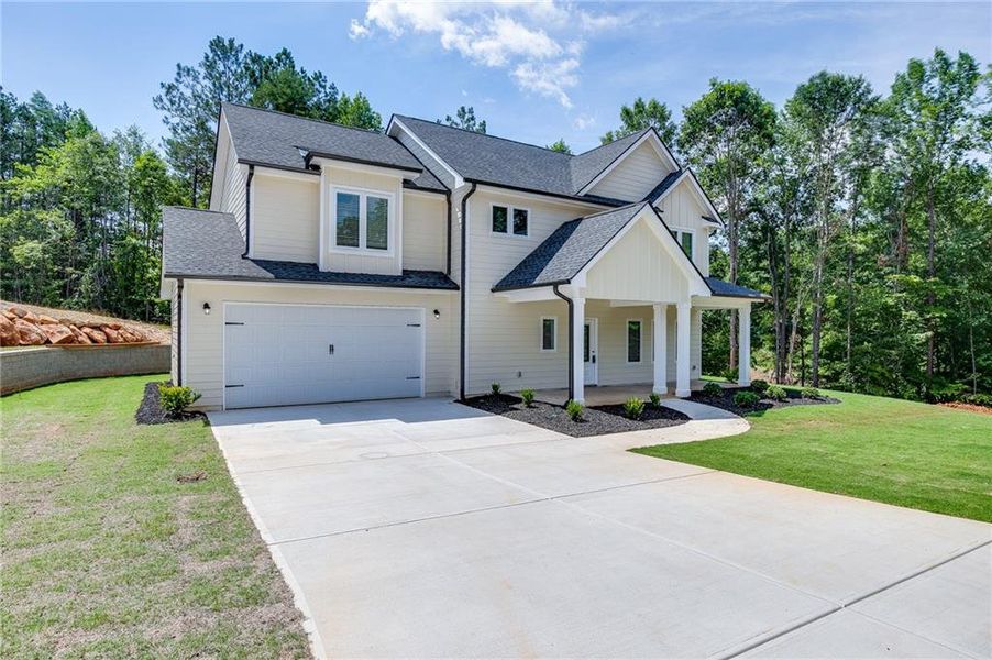 Front exterior of a new home in , Toccoa, GA, highlighting curb appeal (Image 28). Front exterior of a new home in , Toccoa, GA, highlighting curb appeal (Image 28).