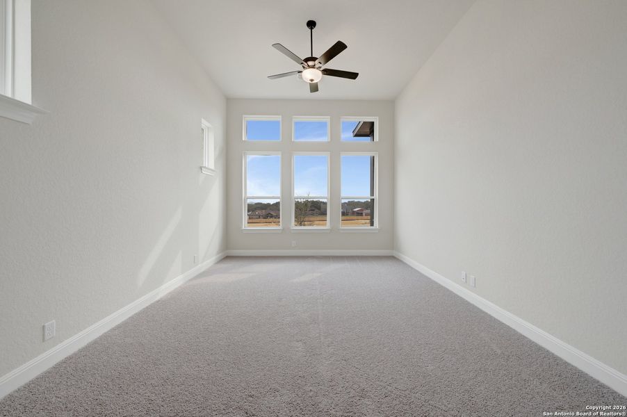Spacious, unfurnished interior of a new home in Windsong - Reserve Series, Boerne (Image 48).