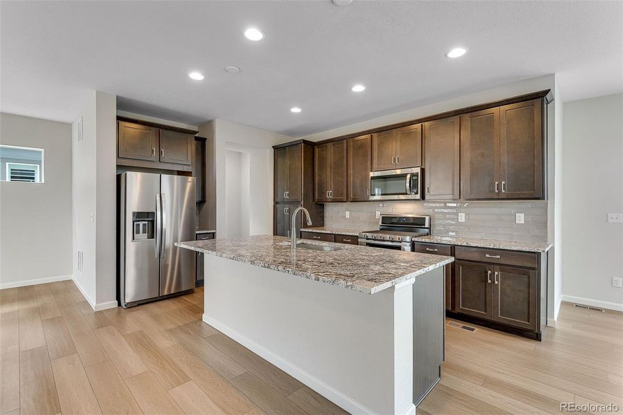 Furnished interior view inside a new home in Crescendo Collection at Reunion, Commerce City (Image 7). Furnished interior view inside a new home in Crescendo Collection at Reunion, Commerce City (Image 7).