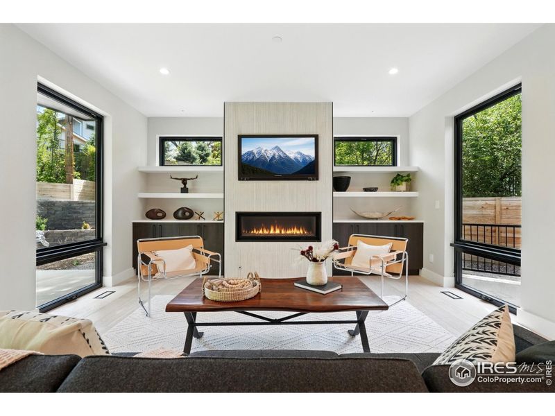 48" gas fireplace + built-ins. TV included 48" gas fireplace + built-ins. TV included