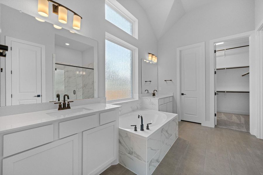 Primary Bath retreat with dual vanities & garden tub