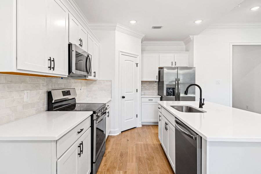 Furnished interior view inside a new home in Sentinel Ridge, Pace (Image 6).