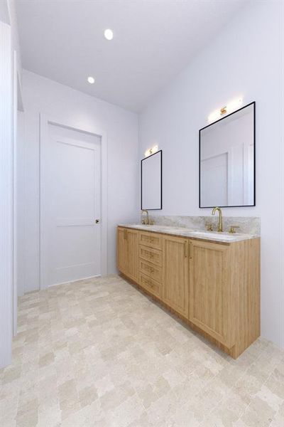 Bathroom featuring double vanity, recessed lighting, and light floors