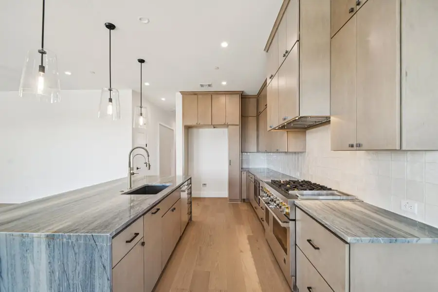 Furnished interior view inside a new home in Milky Way at River Place, Austin (Image 7).