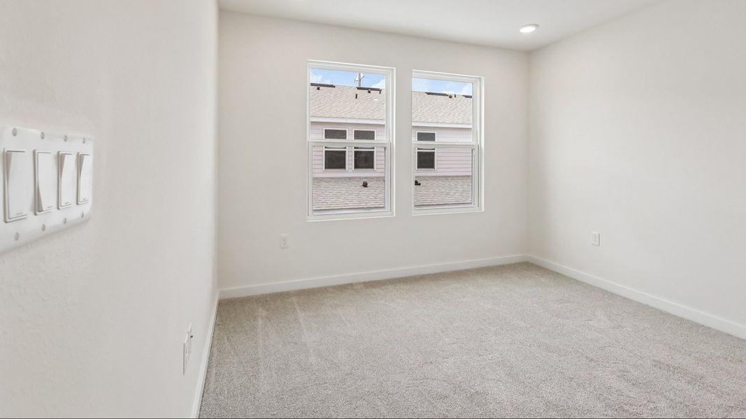 Furnished interior view inside a new home in Cyrene at Harmony, St. Cloud (Image 14).