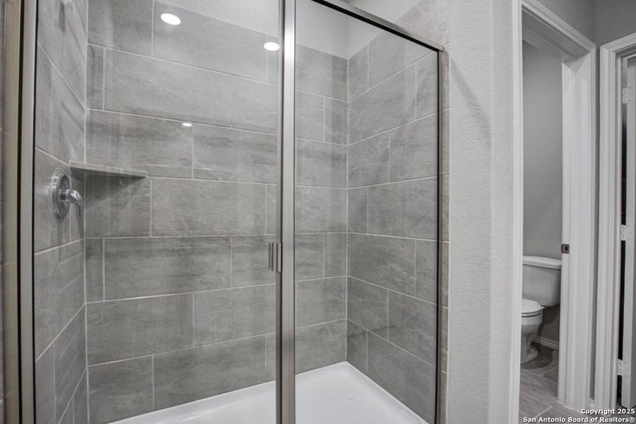 Furnished interior view inside a new home in Hickory Ridge, San Antonio (Image 23).