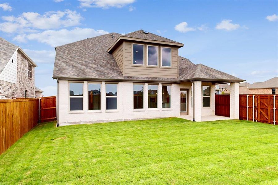 Front exterior of a new home in , Celina, TX, highlighting curb appeal (Image 13). Front exterior of a new home in , Celina, TX, highlighting curb appeal (Image 13).