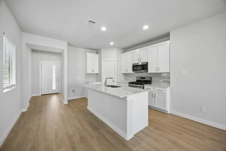 Kitchen in the Birch home plan by Trophy Signature Homes – REPRESENTATIVE PHOTO Kitchen in the Birch home plan by Trophy Signature Homes – REPRESENTATIVE PHOTO