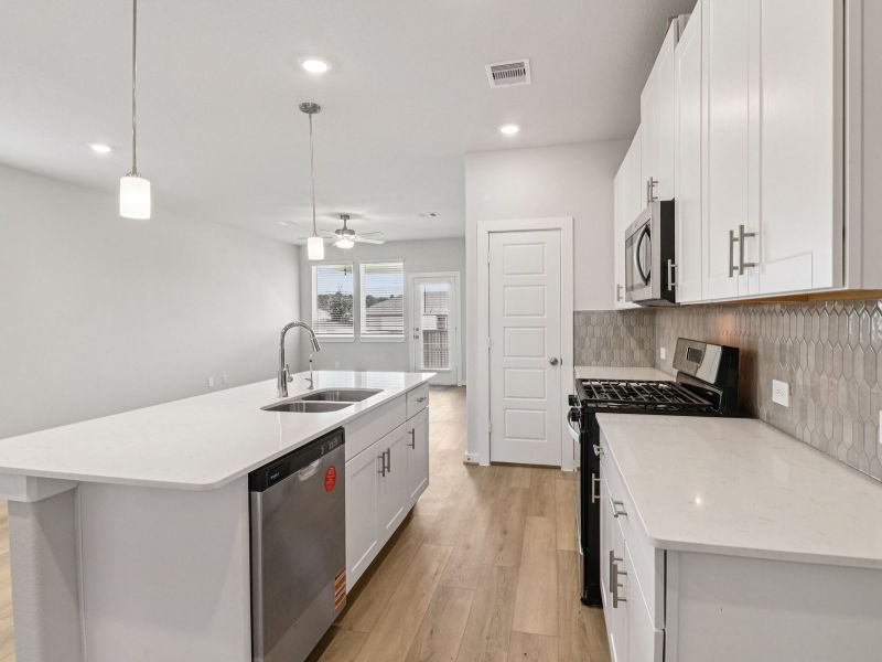 Furnished interior view inside a new home in Sanford Farms - Traditional Series, Waller (Image 5).