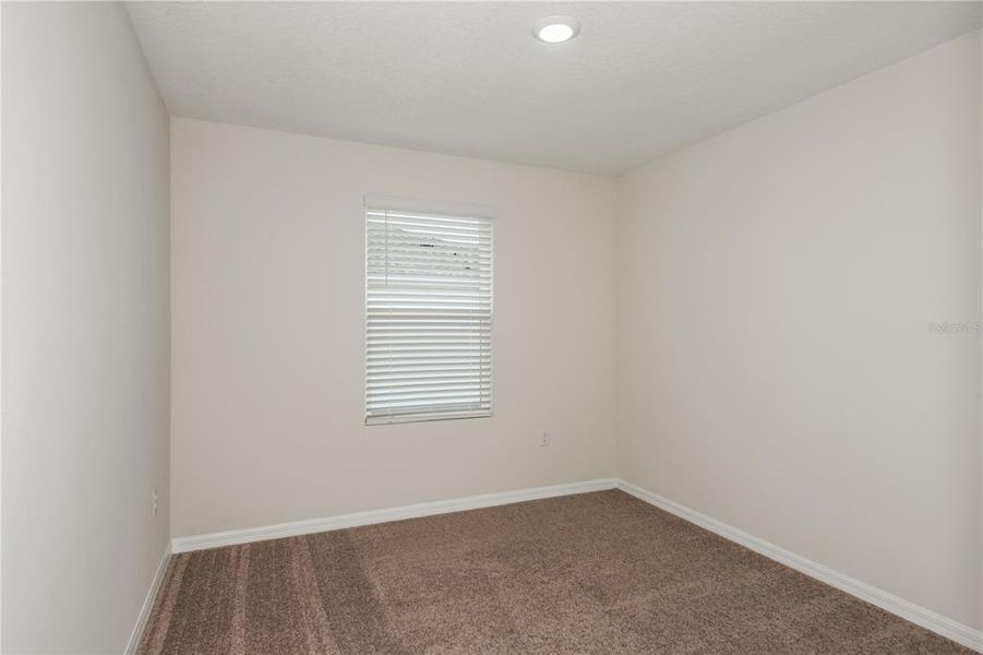 Spacious, unfurnished interior of a new home in Pasadena Woods, Dade City (Image 17).