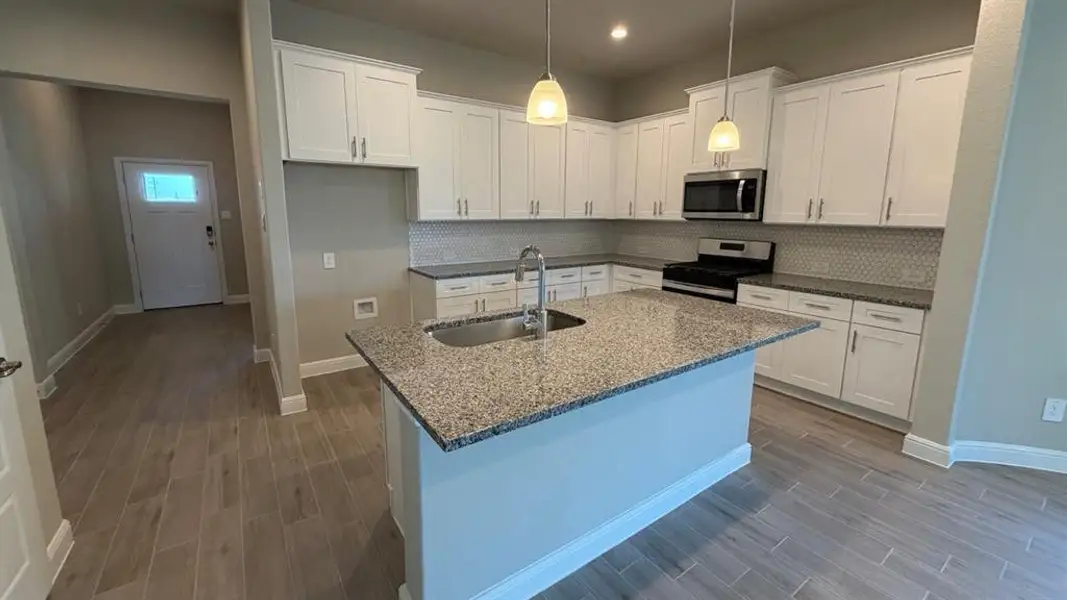 Furnished interior view inside a new home in Rock Creek Ranch, Fort Worth (Image 9).