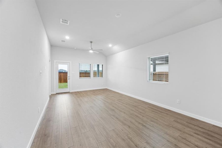 Living Room in the Cedar home plan by Trophy Signature Homes – REPRESENTATIVE PHOTO