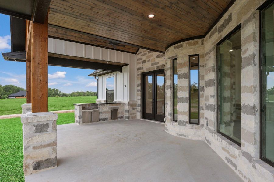 Exterior details and patio area of a home in , Bryan (Image 3).