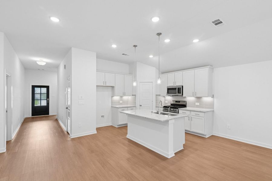 Furnished interior view inside a new home in Pinewood at Grand Texas, New Caney (Image 6).