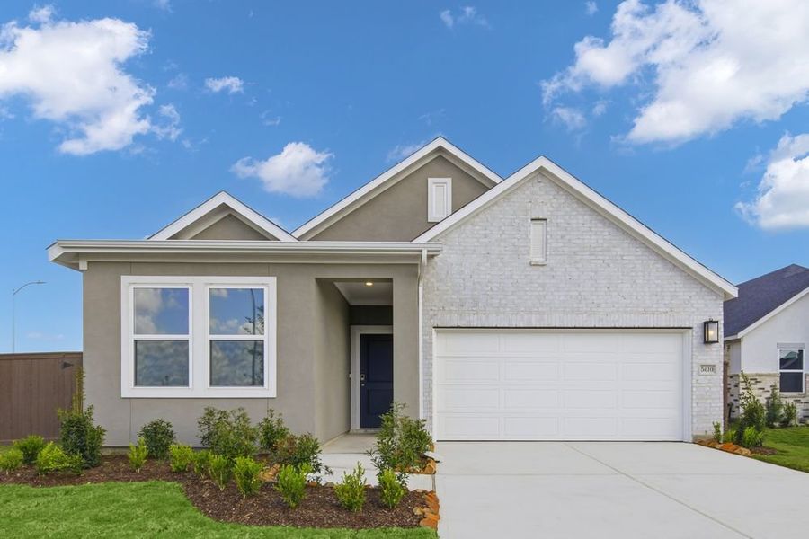 Front exterior of a new home in Newport Grove 50s, Crosby, TX, highlighting curb appeal (Image 19). Front exterior of a new home in Newport Grove 50s, Crosby, TX, highlighting curb appeal (Image 19).