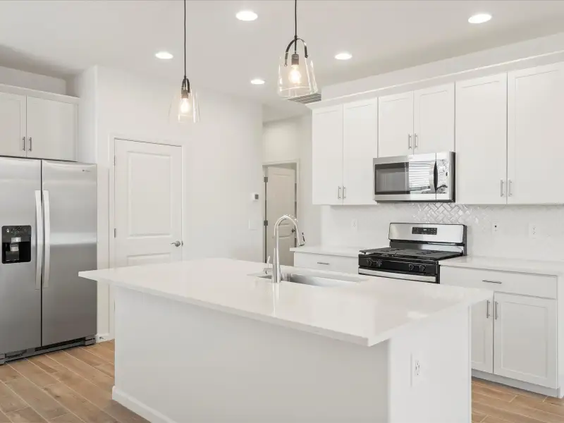 Front exterior of a new home in Summerstone II, Marana, AZ, highlighting curb appeal (Image 1).
