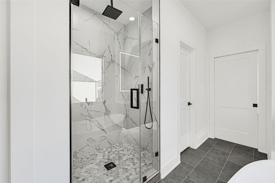 Primary Bath separate shower and walk in closet
