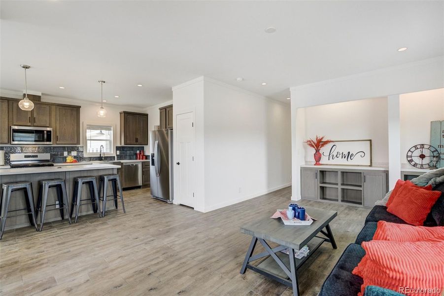 Open Concept living area with a Built-in Entertainment Center