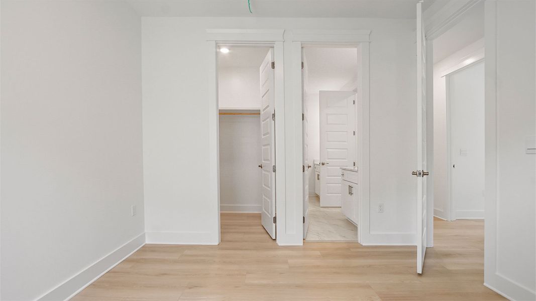 Representative unfurnished interior of a home built from the Magnolia by D.R. Horton in Breakfast Point East Phase II, Panama City Beach (Image 34).