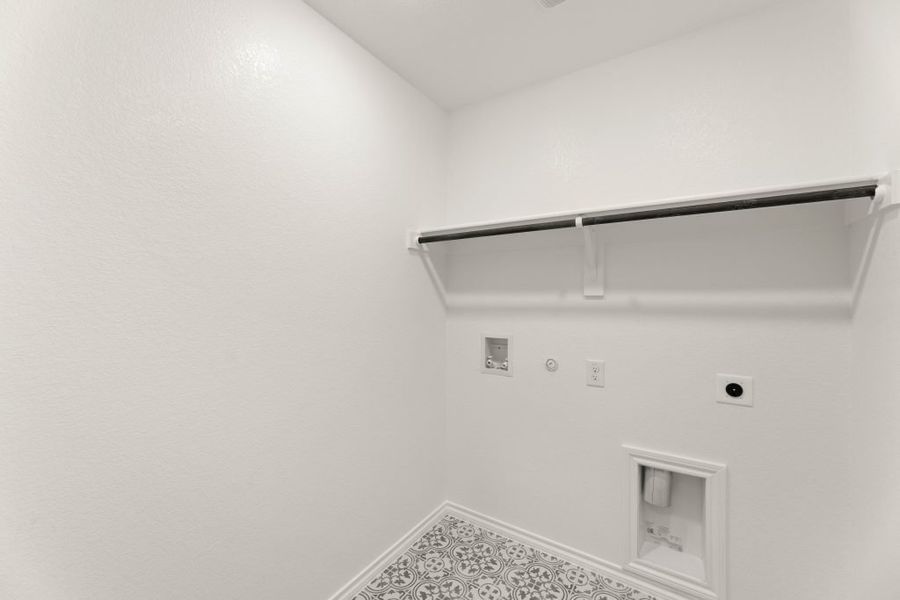 Representative exterior photo of a completed home built from the Lexington by Impression Homes in Baker Farms, Cleburne, TX (Image 25).