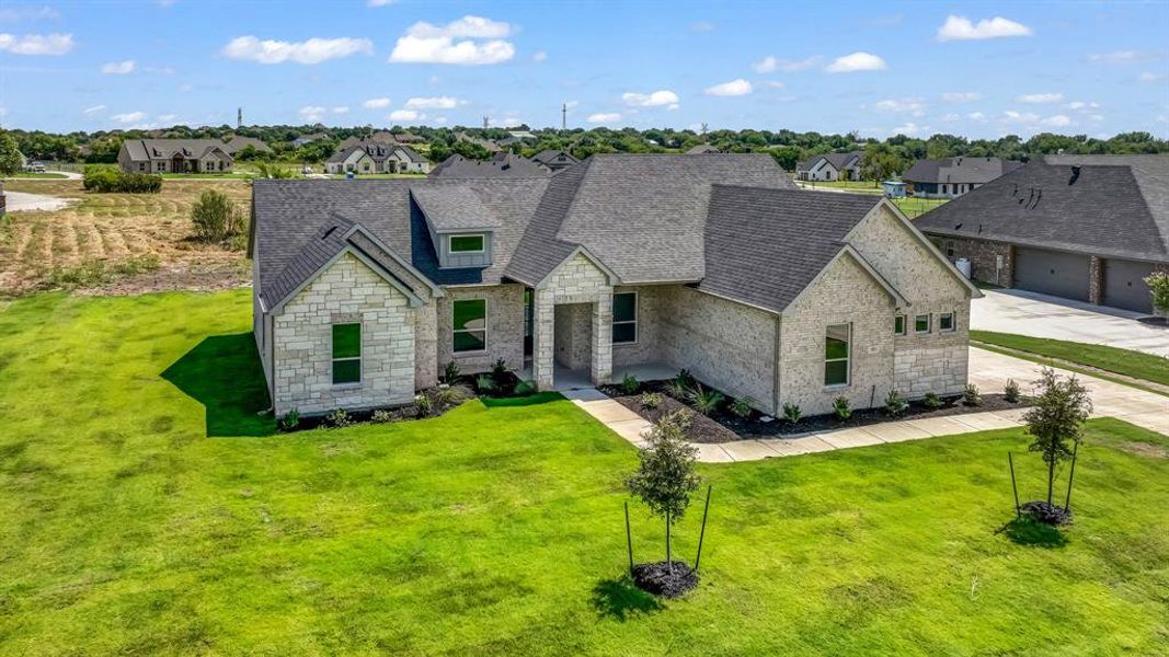 Front exterior of a new home in , Weatherford, TX, highlighting curb appeal (Image 18). Front exterior of a new home in , Weatherford, TX, highlighting curb appeal (Image 18).