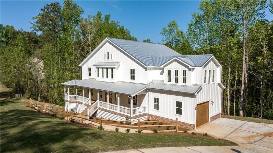Front exterior of a new home in , Flowery Branch, GA, highlighting curb appeal (Image 26).