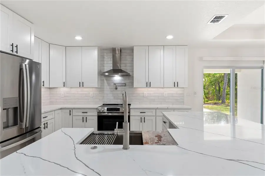 Furnished interior view inside a new home in , Weeki Wachee (Image 6).