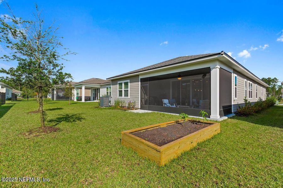 Front exterior of a new home in , Yulee, FL, highlighting curb appeal (Image 19). Front exterior of a new home in , Yulee, FL, highlighting curb appeal (Image 19).