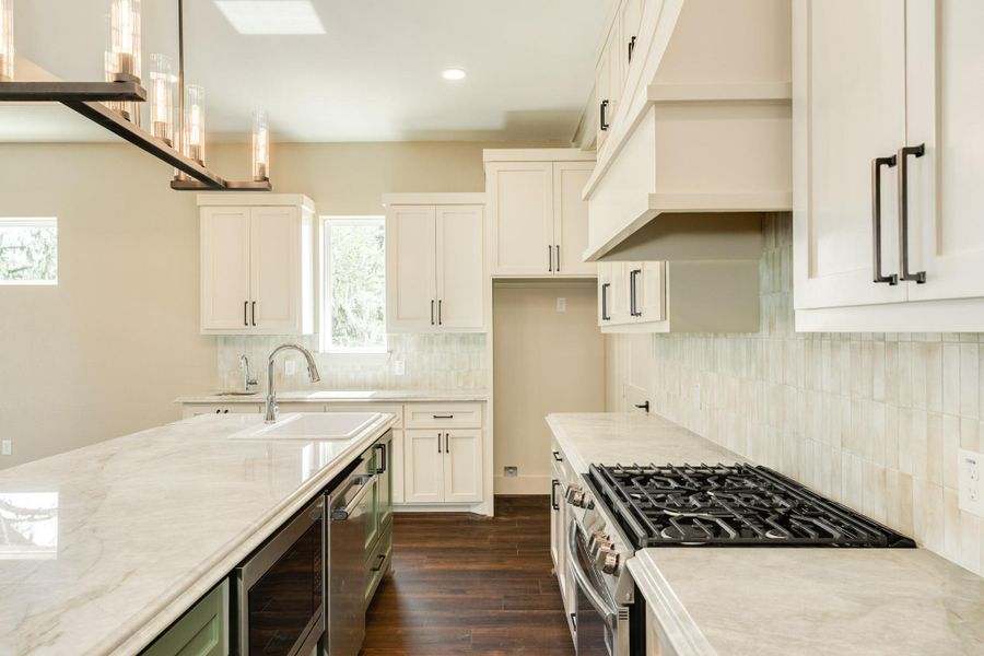 This kitchen was designed and thoughtfully created to provide convience and an effortless flow for the chef of the home.  With a gas range and all state of the art appliances this kitchen is a true gem.