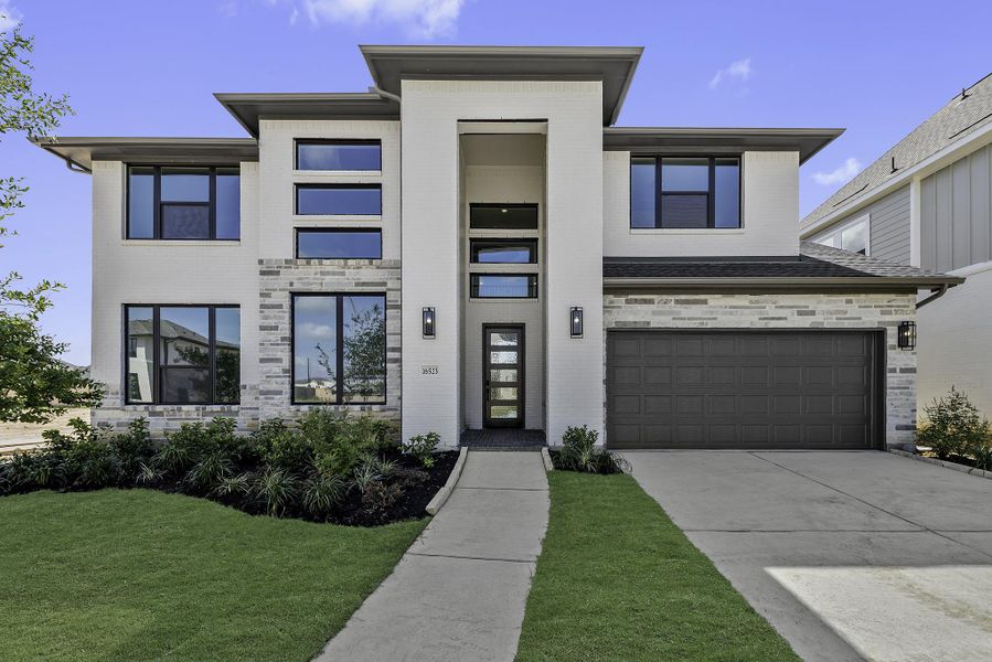 Front exterior of a new home in Jubilee, Hockley, TX, highlighting curb appeal (Image 2). Front exterior of a new home in Jubilee, Hockley, TX, highlighting curb appeal (Image 2).