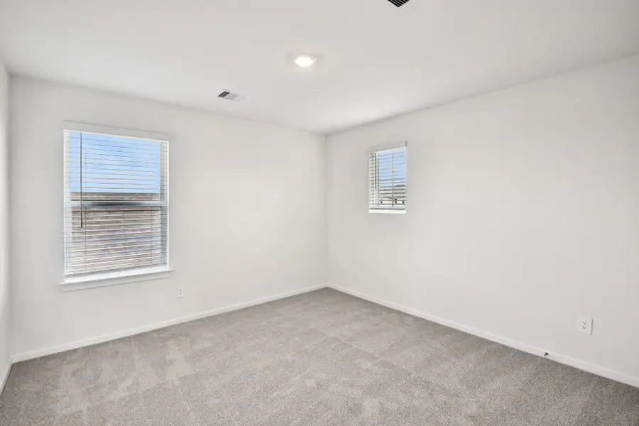 Spacious, unfurnished interior of a new home in Landing Meadows - Traditional Series, New Caney (Image 35).