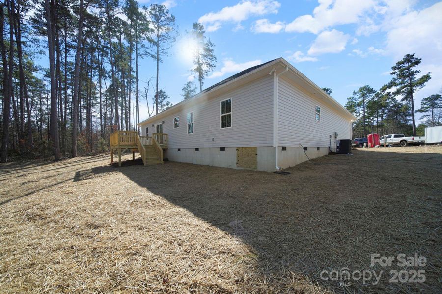 Exterior details and patio area of a home in , Oakboro (Image 3).