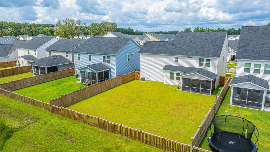 Front exterior of a new home in Heron's Walk at Summers Corner: Coastal Collection, Summerville, SC, highlighting curb appeal (Image 19).