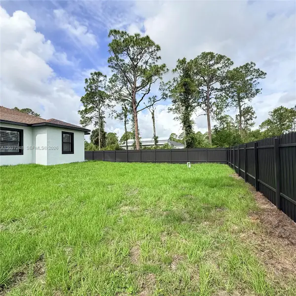 Exterior details and patio area of a home in , Lehigh Acres (Image 3).