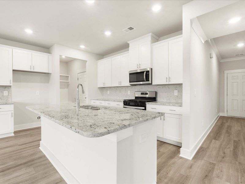 Photo is not of the actual home, but is an inspirational photo of builder’s model home and may depict options, furnishings, and/or decorator features that are not included