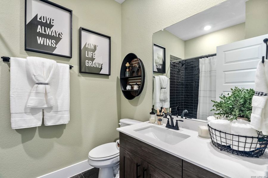 Furnished interior view inside a new home in Village at Three Oaks, Seguin (Image 3).