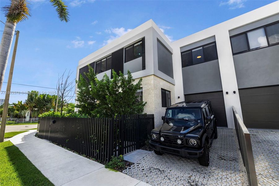 Front Facade and Driveway to Garage