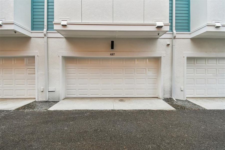 Front exterior of a new home in Towns at Union, St. Petersburg, FL, highlighting curb appeal (Image 2).
