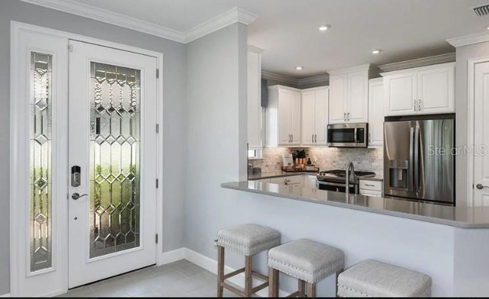 Furnished interior view inside a new home in Esplanade at Azario Lakewood Ranch, Bradenton (Image 10).