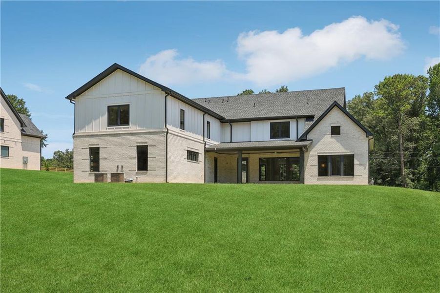 Front exterior of a new home in , Braselton, GA, highlighting curb appeal (Image 35).