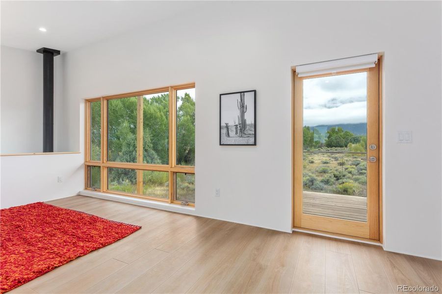 Eastern views and access to eastern-facing covered deck.