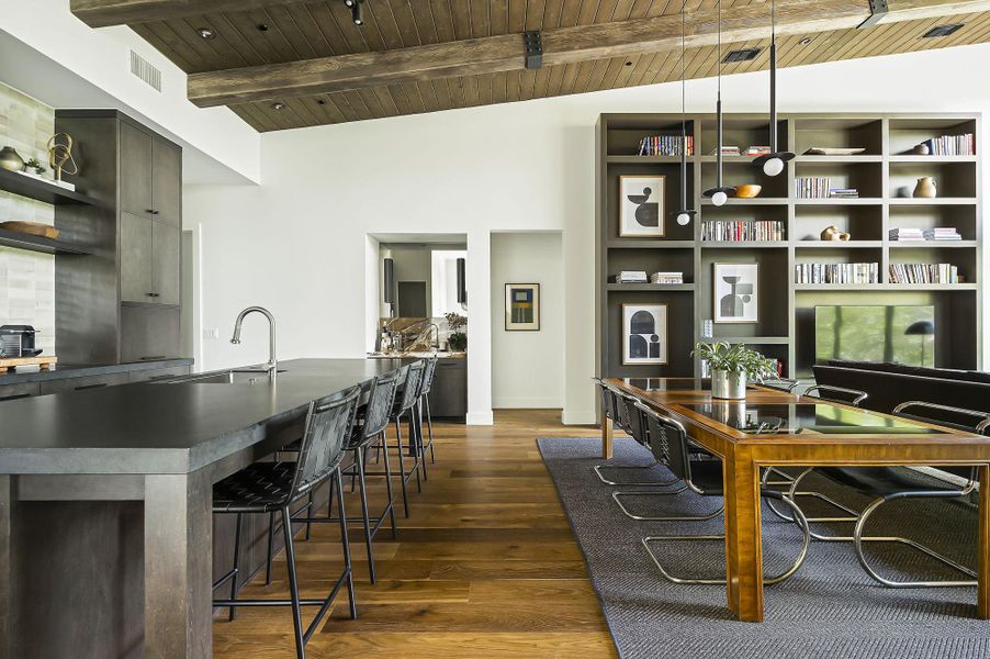 Warm wood tones in an open and angular space give this modern home a sophisticate flair