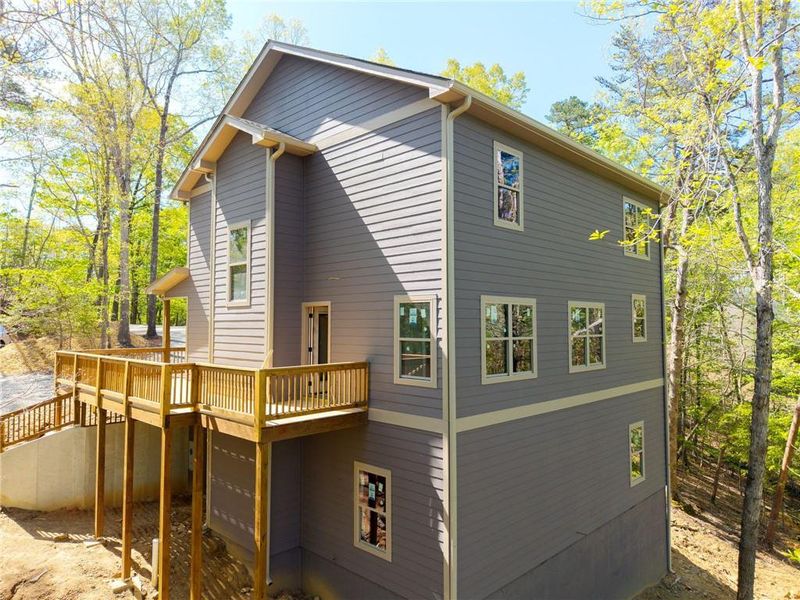 Exterior details and patio area of a home in , Ellijay (Image 14).