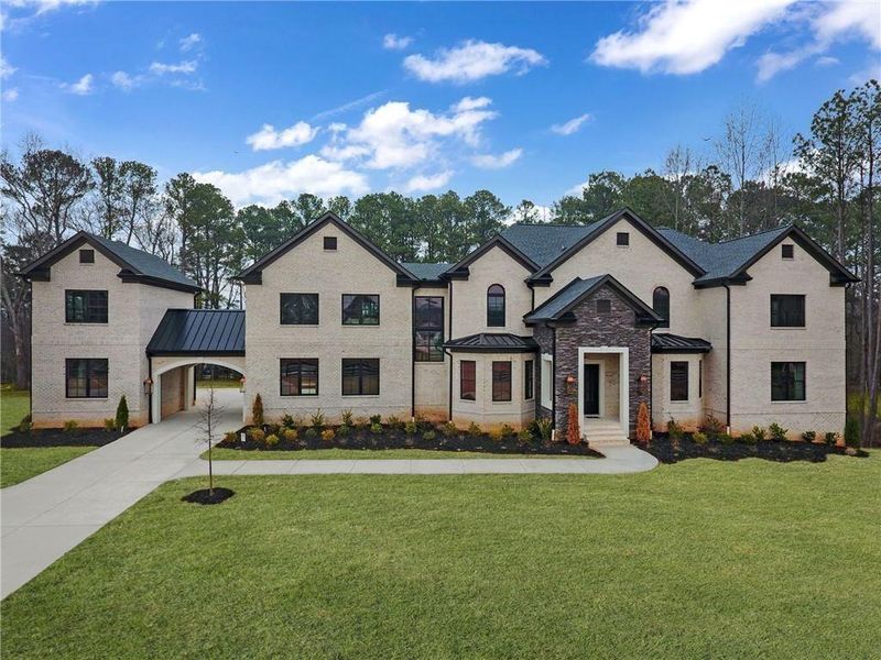 Front exterior of a new home in , Milton, GA, highlighting curb appeal (Image 30). Front exterior of a new home in , Milton, GA, highlighting curb appeal (Image 30).